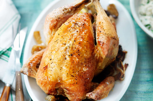 Roasted chicken breast with mashed potato, gravy & seasonal vegetables